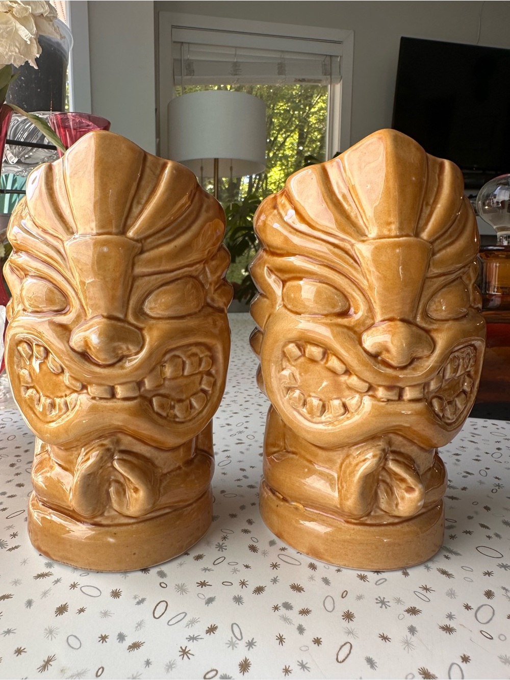 Pair of Ceramic Lion Tiki Mugs with Prayer Hands